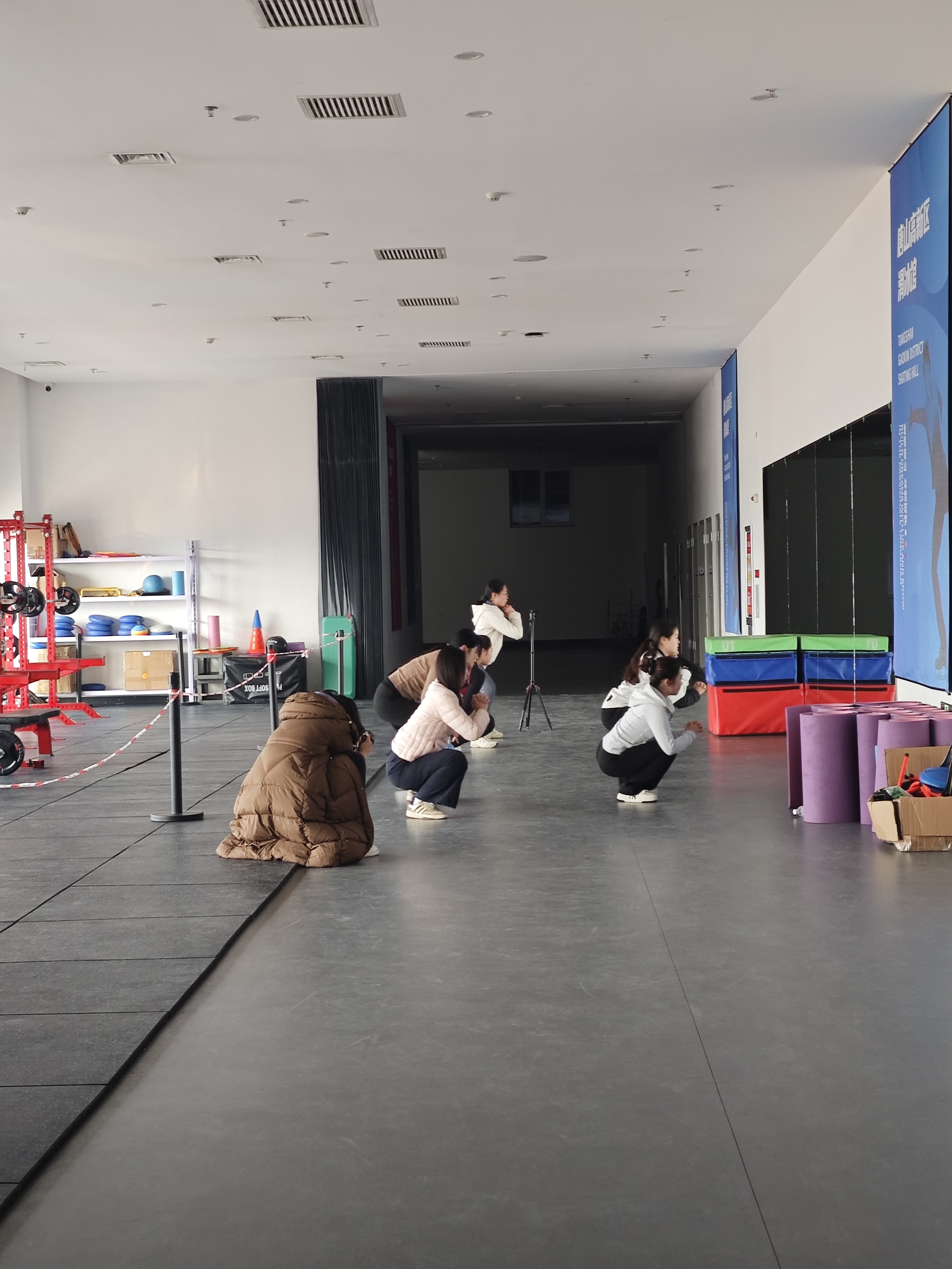 Adult learners practising together on the ice